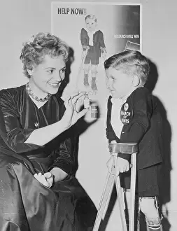Comedienne Actress Judy Holliday with Polio Poster Boy