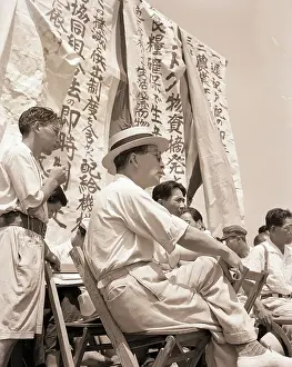 Communist Leader at Rice Rally with Banners