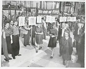 Communist Sympathizers Protesting with Signs