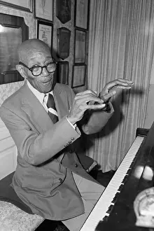 Plaque Prints: Composer Eubie Blake Playing Piano at Home