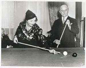 Conde Nast and Female Friend Playing Pool