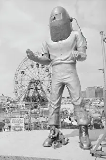Huge Prints: Coney Island Astronaut Gets a Shoeshine