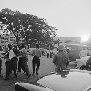Congolese Rebels Attacking Albert Ndele with Soldier Nearby