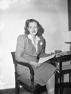 Congresswoman Helen Douglas Sitting with Text