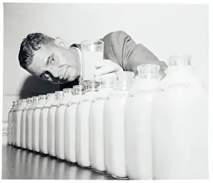 Conrado Asenjo Standing Behind Bottles of Juice