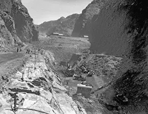 Prints of (Original Caption) 1933-Boulder City, CO- Picture shows an aerial view of mass construction of the Boulder Dam (known now as the Hoover Dam) A Timeless Collection of Hoover Dam Photography: Construction of Boulder Dam