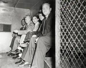 Cage Prints: Convicted Communists in Police Van