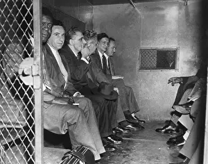 Convicted Communists in Police Vehicle