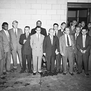 Convicted Communists Pose Outside Court