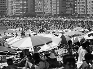 Prints of People enjoy the day at Copacabana Beach, Rio de Janeiro, Brazil, 1969. (Photo by FPG/Archive Photos/Getty Images) Black and White Images Capturing the Essence of Mid-20th Century: Copacabana