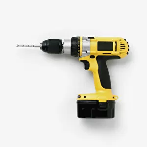 Cordless drill with battery pack attached