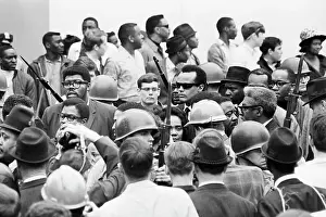 Widow Prints: Coretta S. King'S Head Framed By Helmets