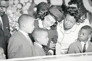 Sympathy Prints: Coretta Scott King Coaxing Her Young Son at His Father's Funeral