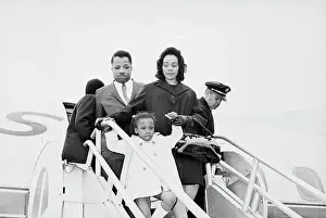 Widow Prints: Coretta Scott King Leaving Airplane With Daughter and Brother in Law
