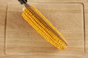 Board Gallery: Corn or maize cob with kitchen knife