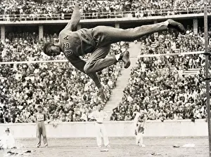 Cornelius Johnson Clearing High Jump Bar