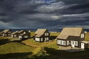 Dramatic Gallery: Cottages, cottage settlement in Hellnar, cloud formation, peninsula Snaefellsnes, West Iceland
