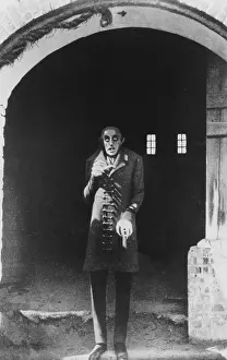 Prints of German actor Max Schreck (1879 - 1936) as the vampire Count Orlok in a promotional still for from F. W. Murnau's expressionist horror film, Nosferatu, Eine Symphonie Des Grauens, 1921 Urban Echoes of America’s Golden Age: Count Orlok