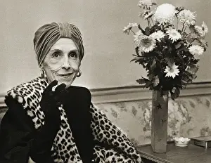 Writer Prints: Countess Karen Blixen Relaxes with Cigarette