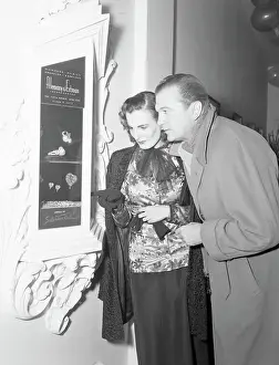 Couple Admiring Jewelry by Salvador Dali