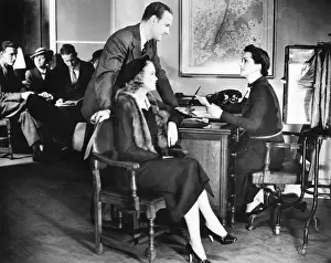 Bending Down Prints: Couple applying for mortgage, talking to clerk (B&W)
