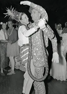 Couple Attending Dali Party Dancing in Costume