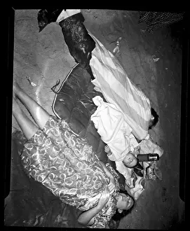 Couple and Baby Sleep on Beach at Coney Island