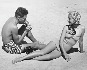 Cigarette Prints: Couple On Beach