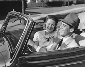 Couple in convertible