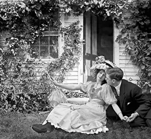 Valentines Day Prints: Couple Courting on Lawn of Ivy Covered House