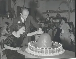 Couple Cutting Sombrero Cake