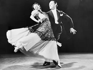 Couple Dancing On Ballroom Floor