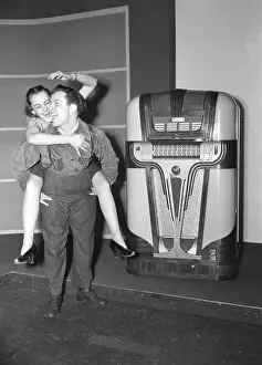 Couple Dancing to Juke Box