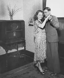 Couple Dancing to Radio
