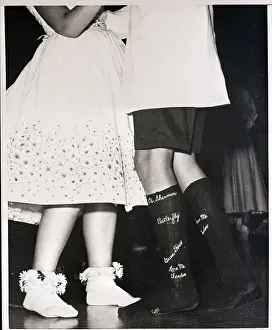 Song Prints: Couple Dancing with Their Unusual Socks