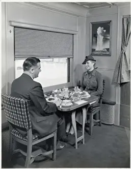 Couple Dining in Train Dining Car