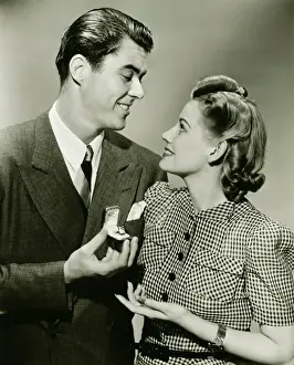 Couple with engagement ring, (B&W)
