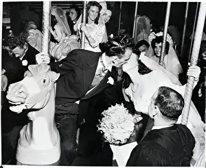 Groom Prints: Couple Getting Married on Merry-Go-Round