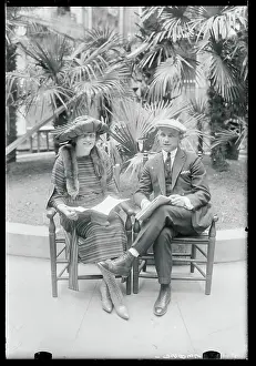 Couple During Giants Gathering Posing in Chairs