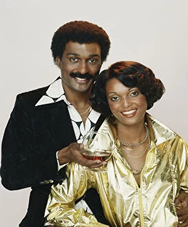 Mid Adult Collection: Couple holding wine glass against white background, close-up, portrait
