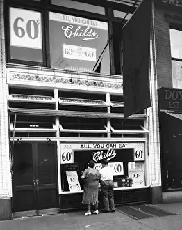 Couple Looking into Childs Restaurant