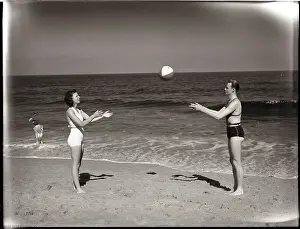 Catching Prints: Couple Playing with Beach Ball