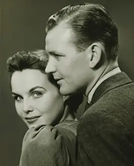 30 35 Years Prints: Couple posing in studio, (B&W), close-up, portrait