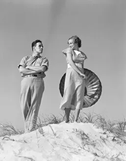Images Dated 10th February 2006: Couple at sand dune, man teasing