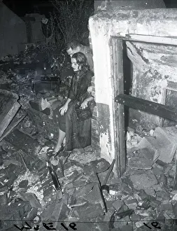 Air Raid Prints: Couple Seated Amidst Rubble;Air Raid Dri