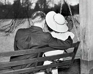 Intimacy Prints: Couple Sitting Together on a Swing