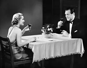 Couple talking over drinks
