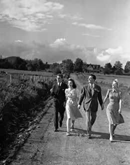 Girlfriend Prints: Two couple walking on country road, (B&W)