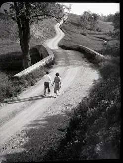 Rural Road Prints: Couple Walking Along Rural Road