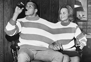 Couple Wearing Two-Person Sweater